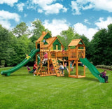 Gorilla Playsets Mountaineer Treehouse Wooden Swing Set with Tube Slide, Rope Ladder, and Sandbox
